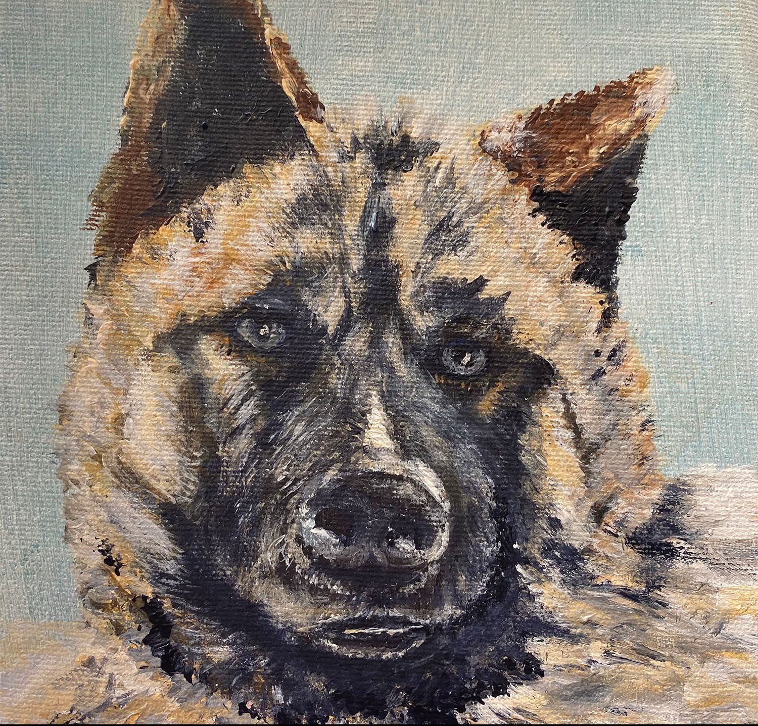 A close up of a dog 's face in a painting.