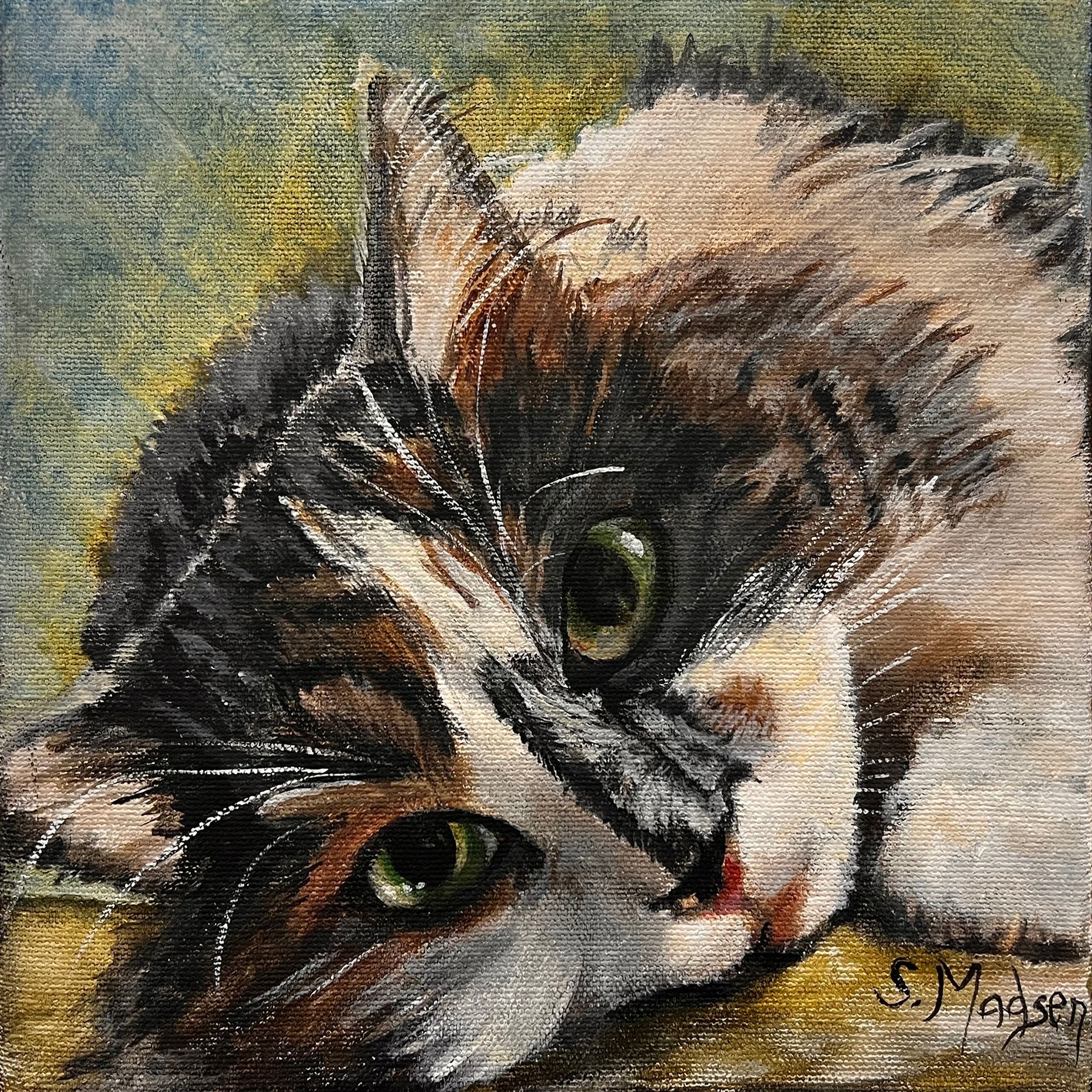 A close up of a painting of a cat with green eyes.