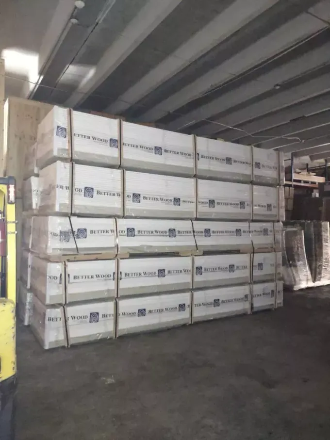 A warehouse filled with lots of boxes stacked on top of each other