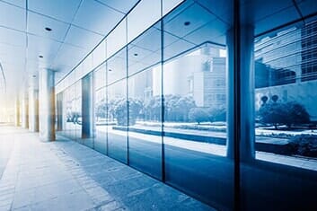 Modern office building with secured doors — Access Control in Baltimore, MD