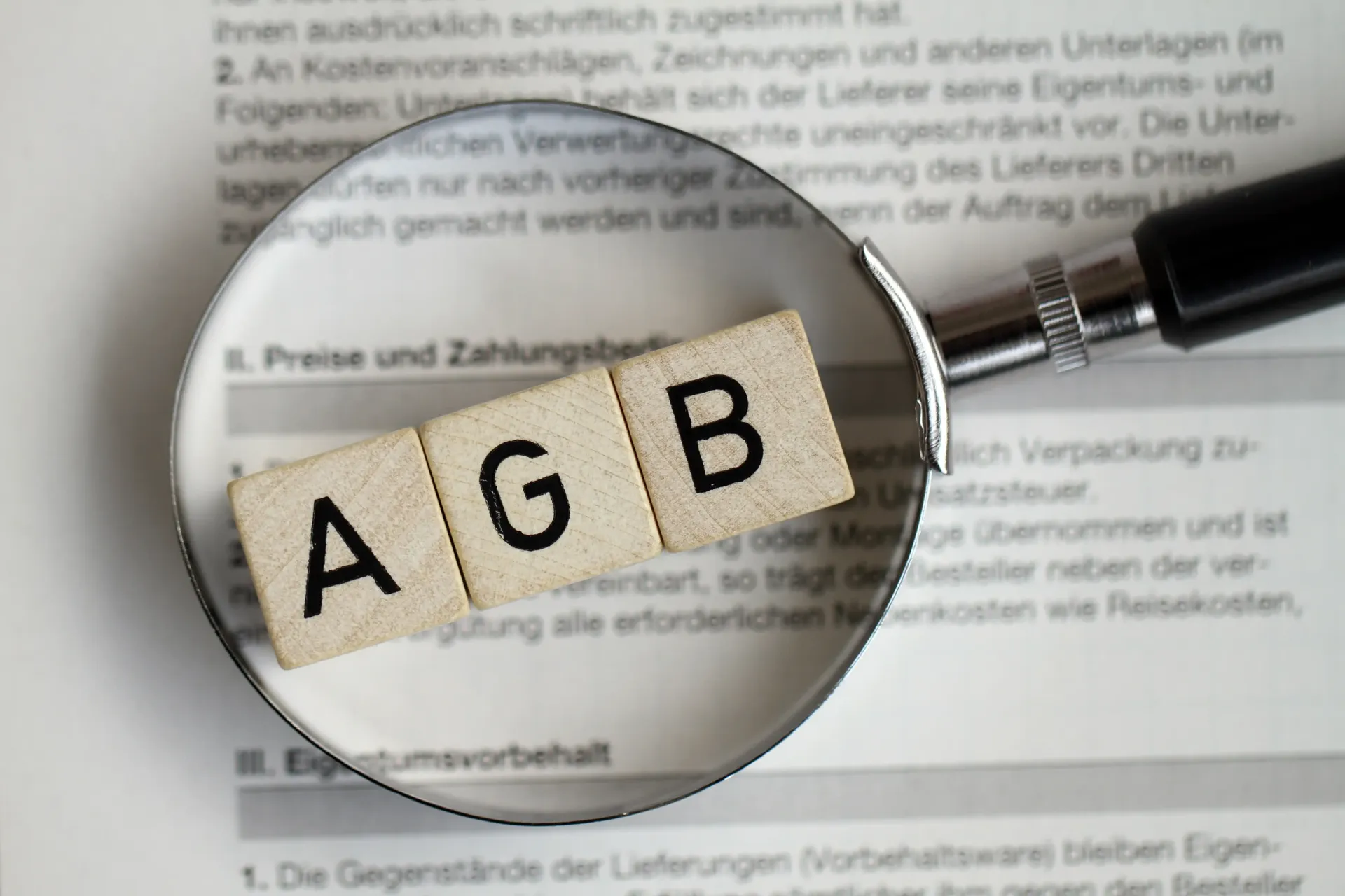 A magnifying glass with the word agb on it