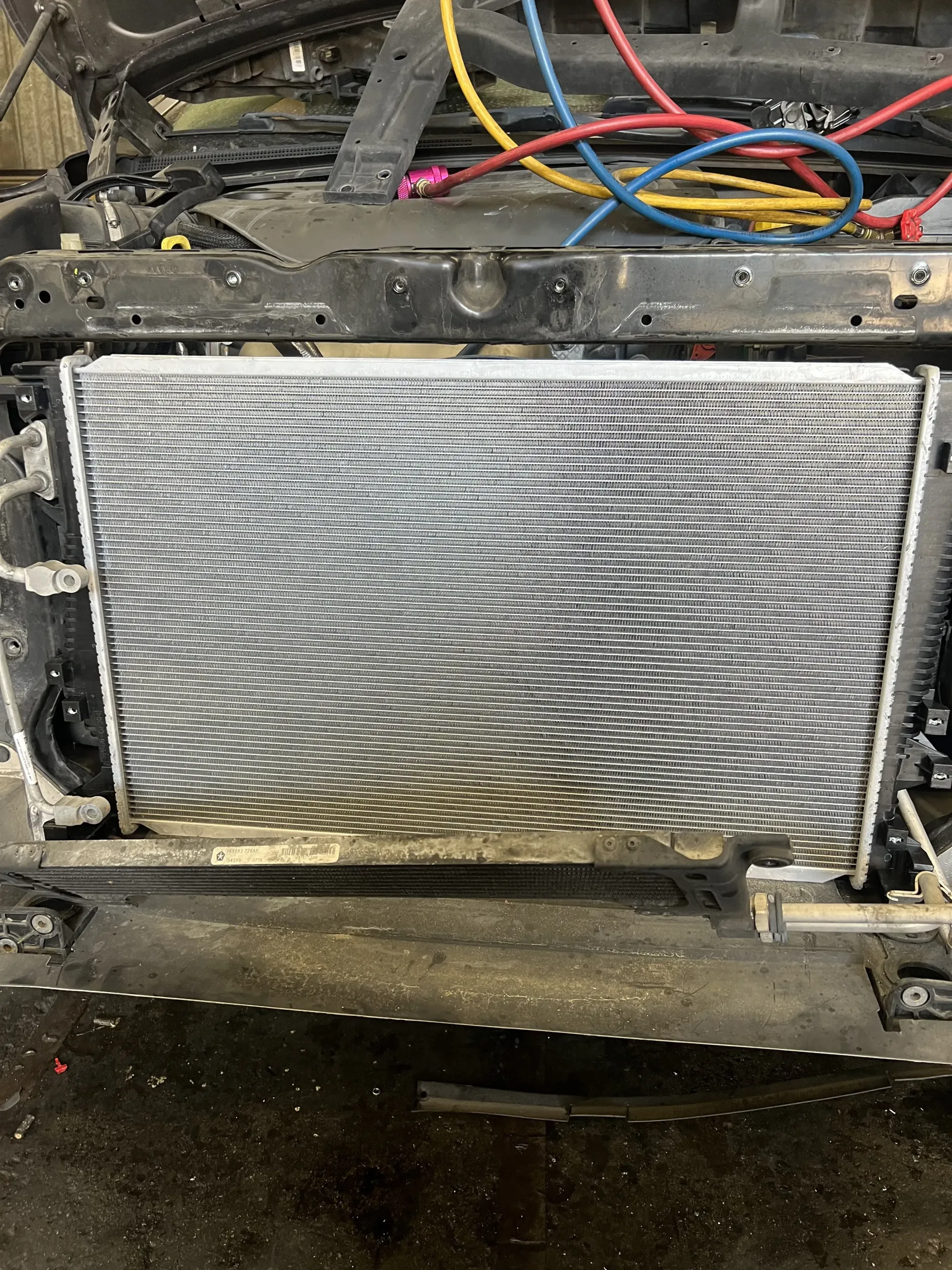 A picture of an intercooler removed from a car engine.