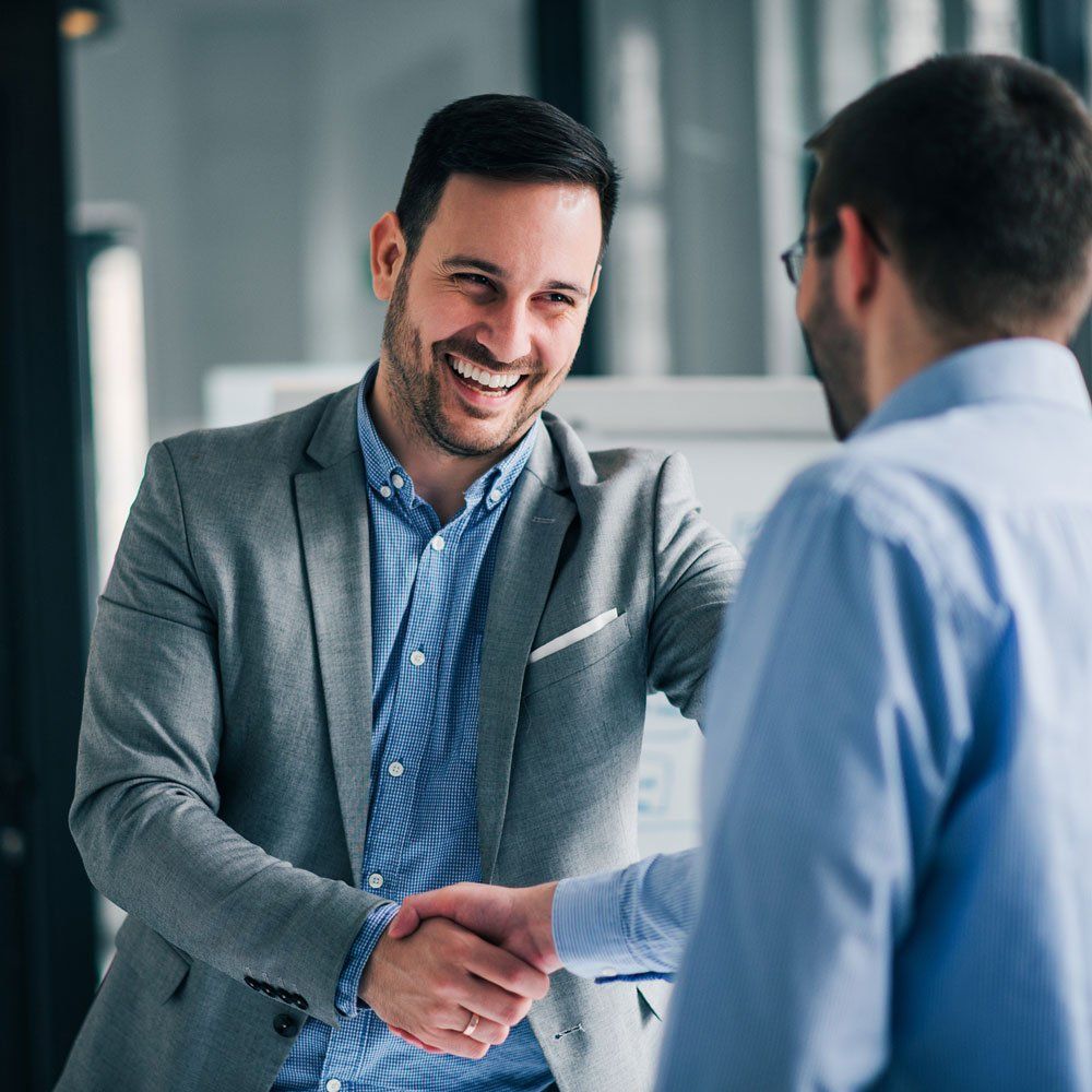 Men Doing a Handshake — Yorkville, IL — Dain Conway’s Tax Service