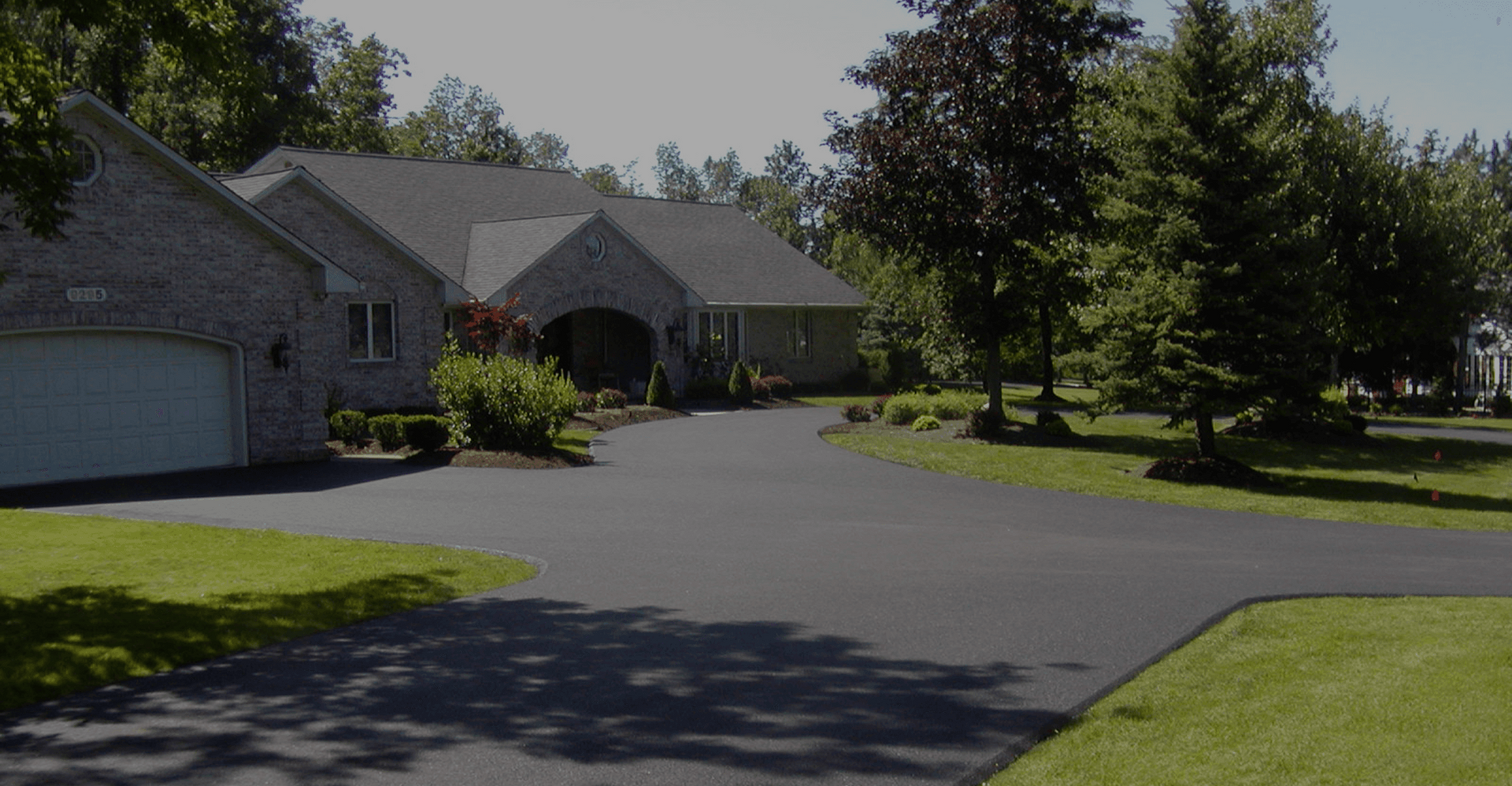 Home Featuring Blacktop Driveway in Alden, NY