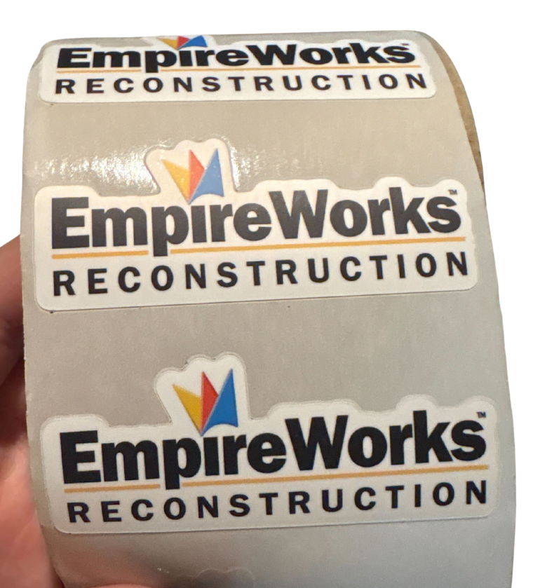 A yellow under construction sign with a wrench on it