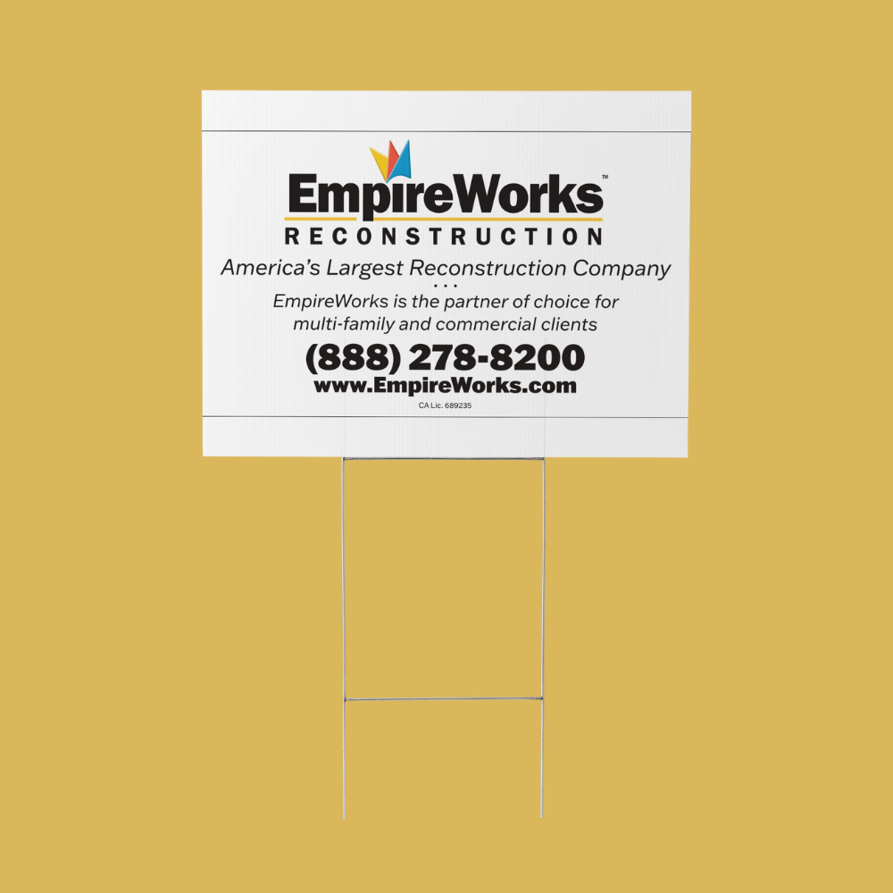 A sign that says empire works reconstruction on it