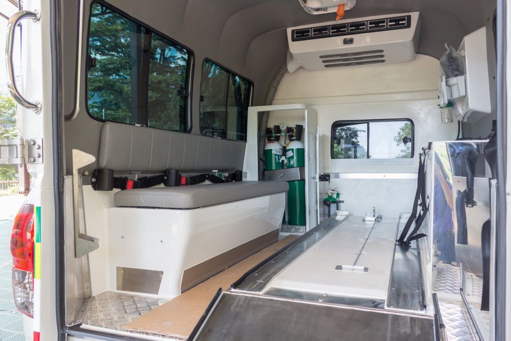 The Inside Of An Ambulance With A Ramp And Oxygen Cylinders — NQ Health In Bayview Heights, QLD