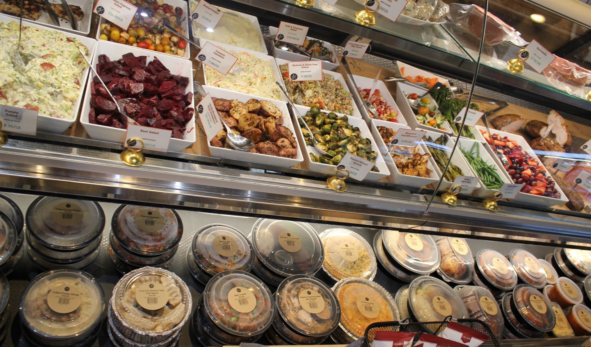 A display case filled with lots of different types of food