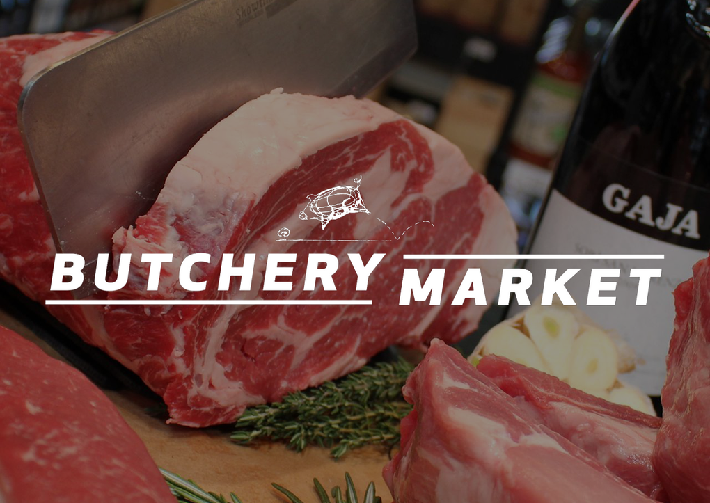 A white logo for a company called truffles butchery market.