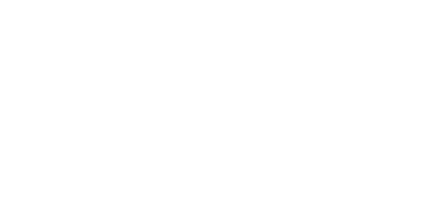 A white logo for a restaurant called truffles restaurant.