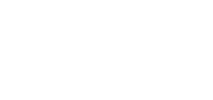 A white logo for a restaurant called truffles restaurant.