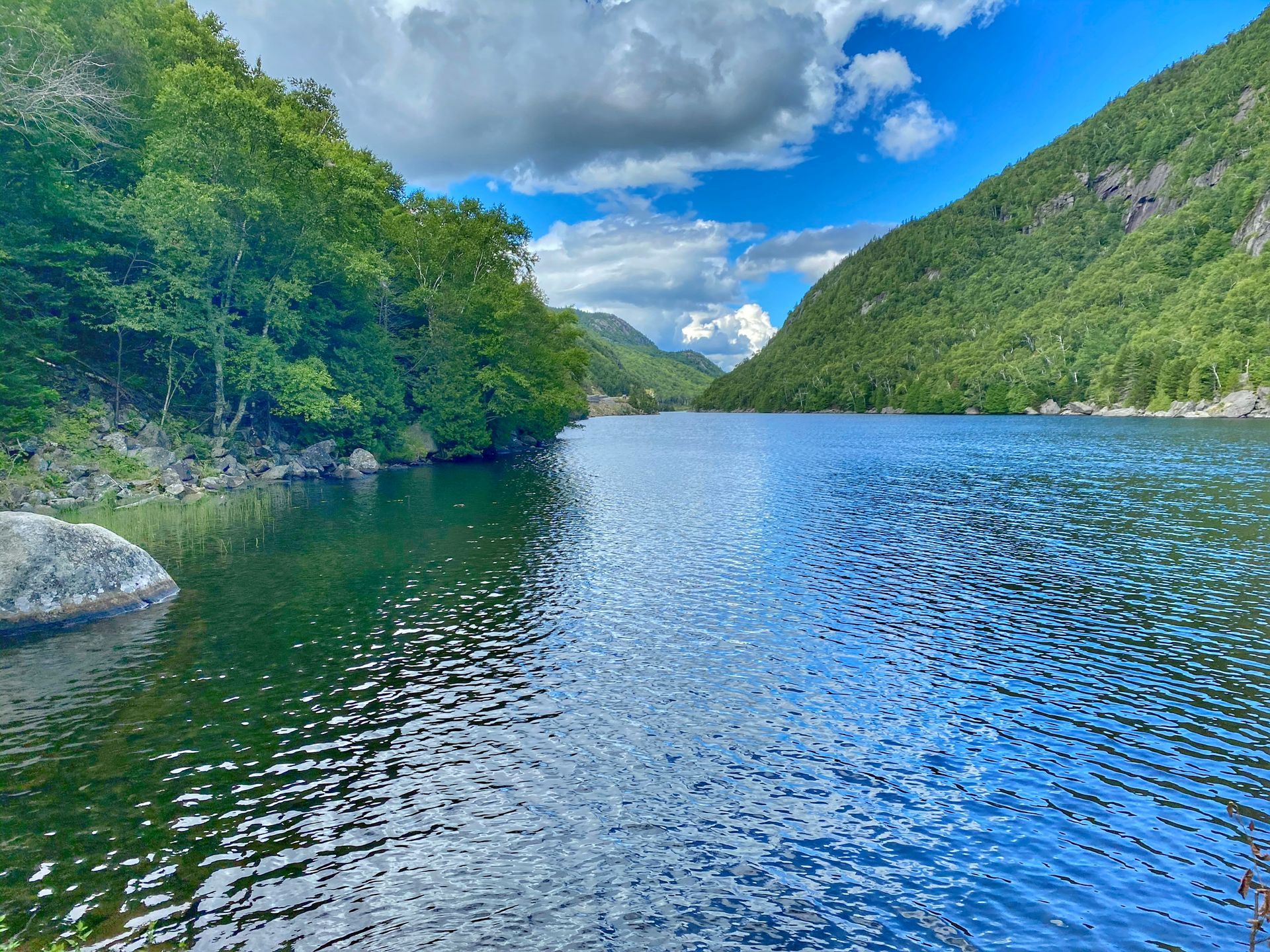 View of Cascade Lake and the surrounding mountains in Lake Placid, NY
