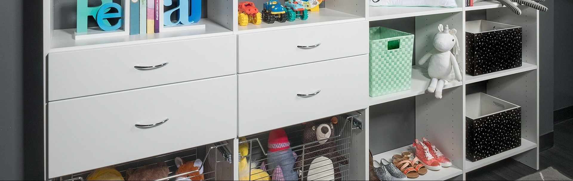 A closet filled with lots of toys and books.