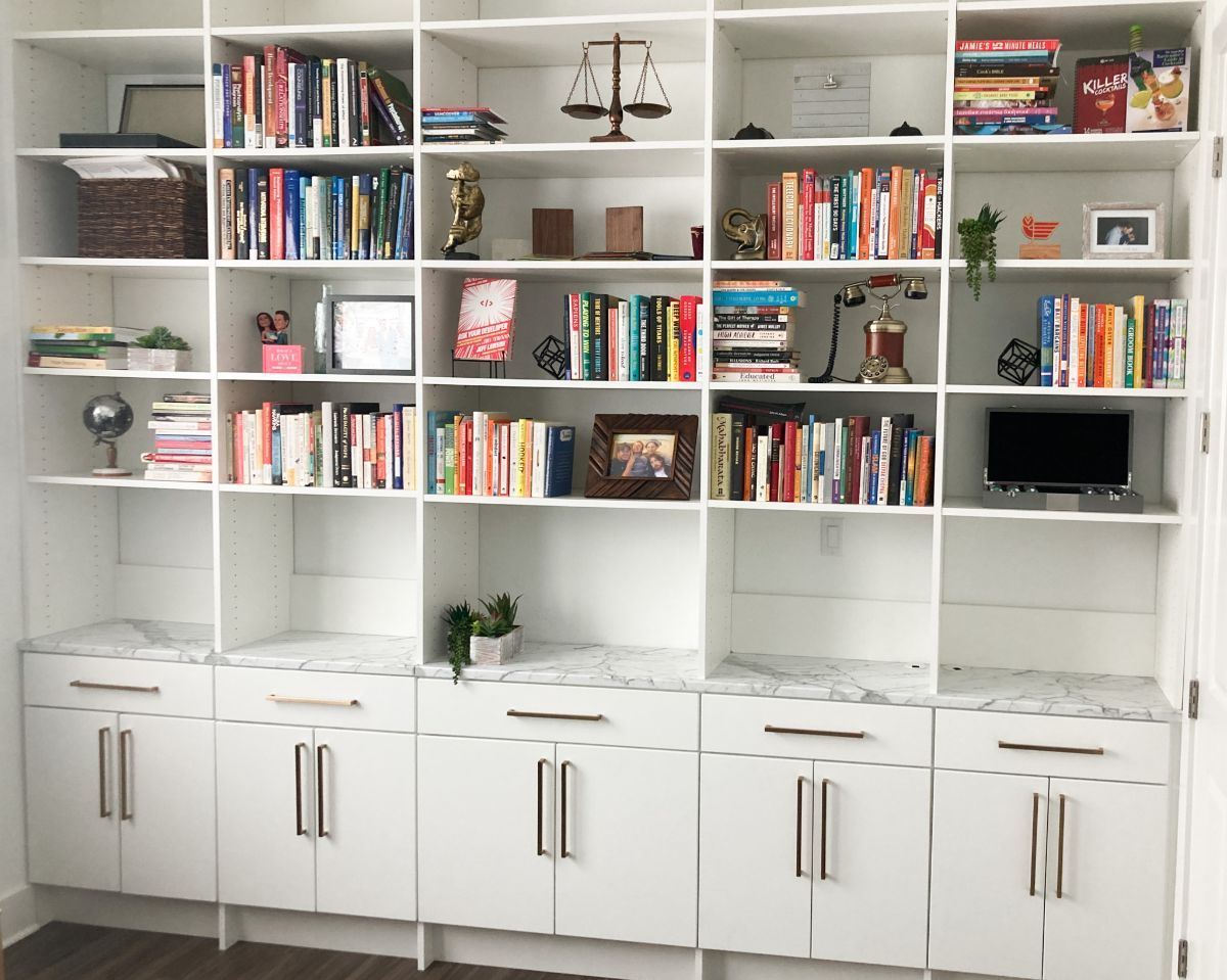 There are many books on the shelves in this room.