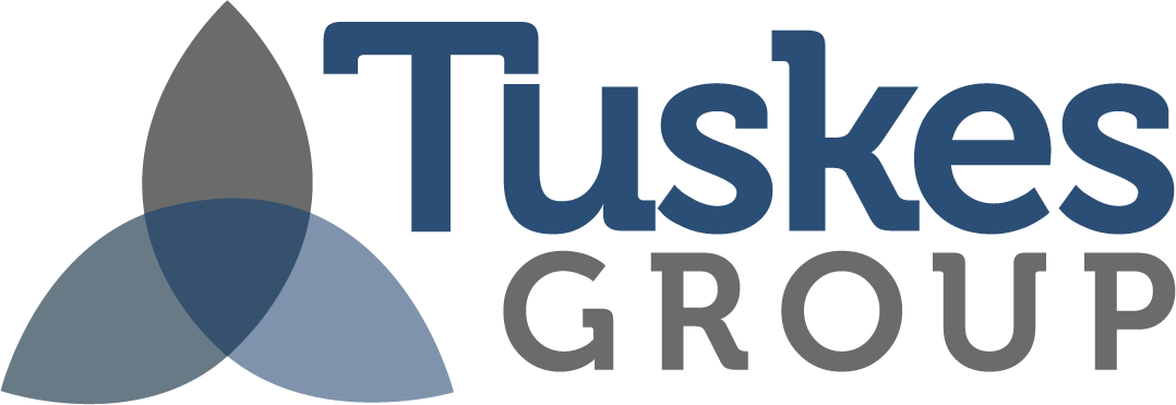 Logo for Tusk Group with overlapping teardrop shapes and text.