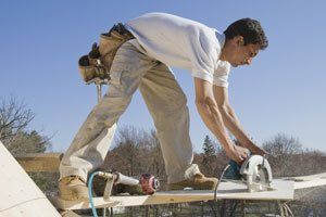 Carpenter Cutting Plank - Home Improvement in Salisbury, MD