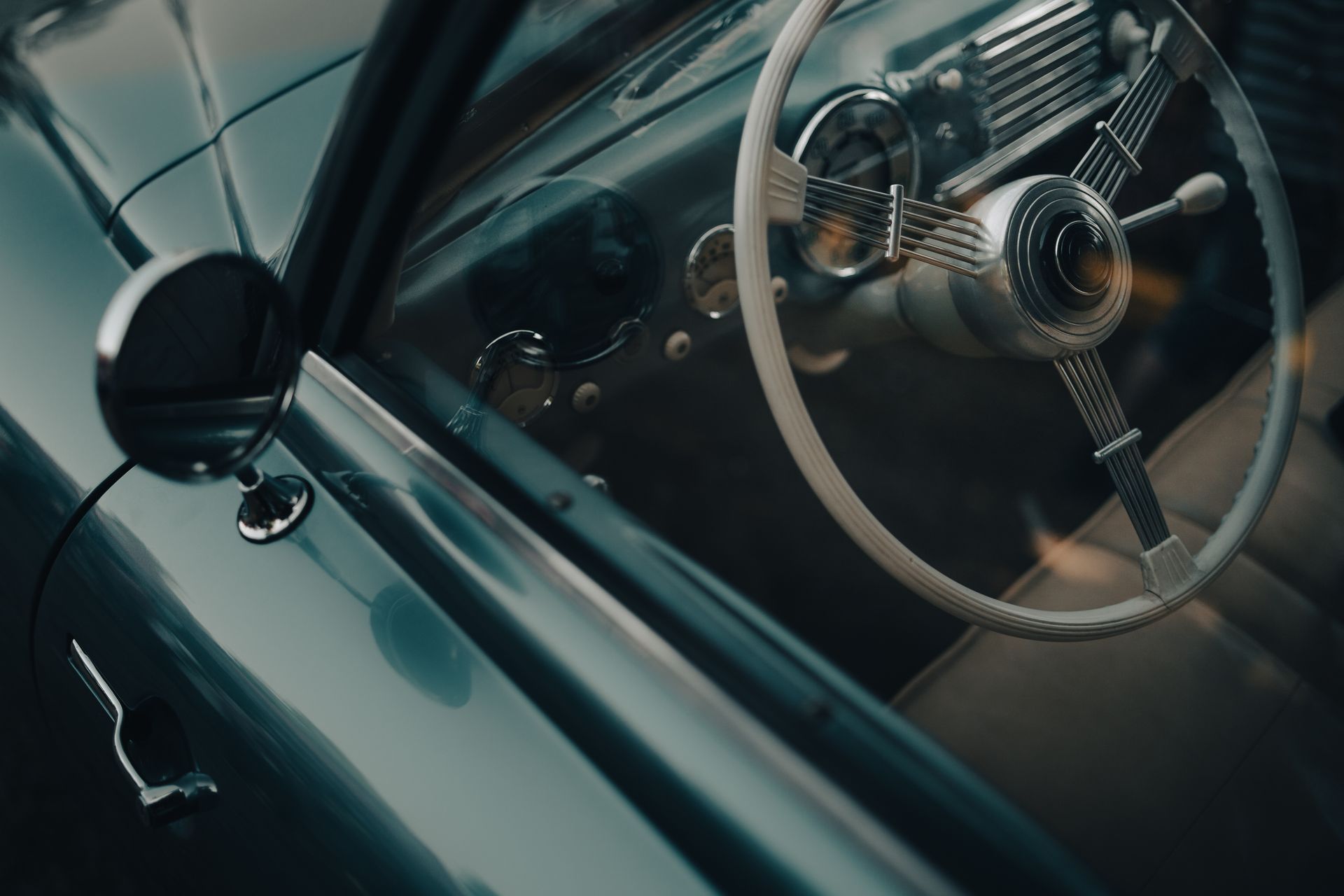 Vintage car dashboard with steering wheel detail. Vintage car dashboard with steering wheel detail.