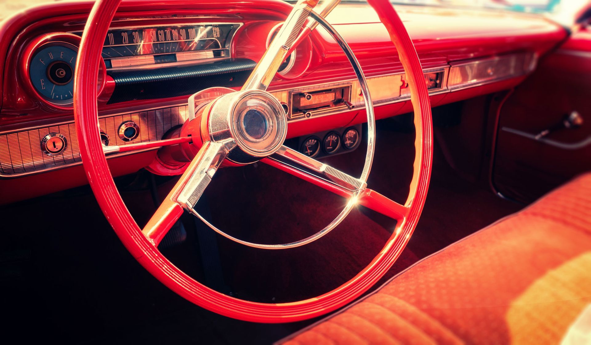 A close up of a steering wheel