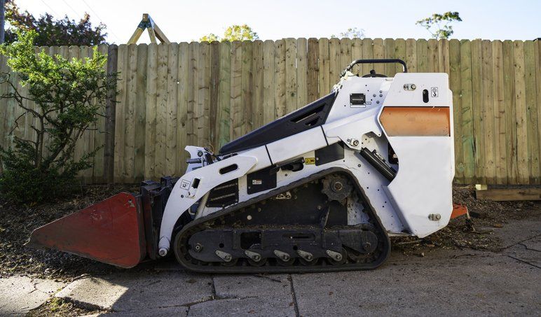 Mini Tractor in A Garden — Penrith, NSW — Colonial Earthmoving