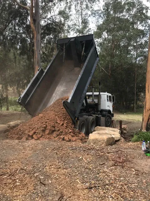 Unloading Dug Out Soil — Penrith, NSW — Colonial Earthmoving