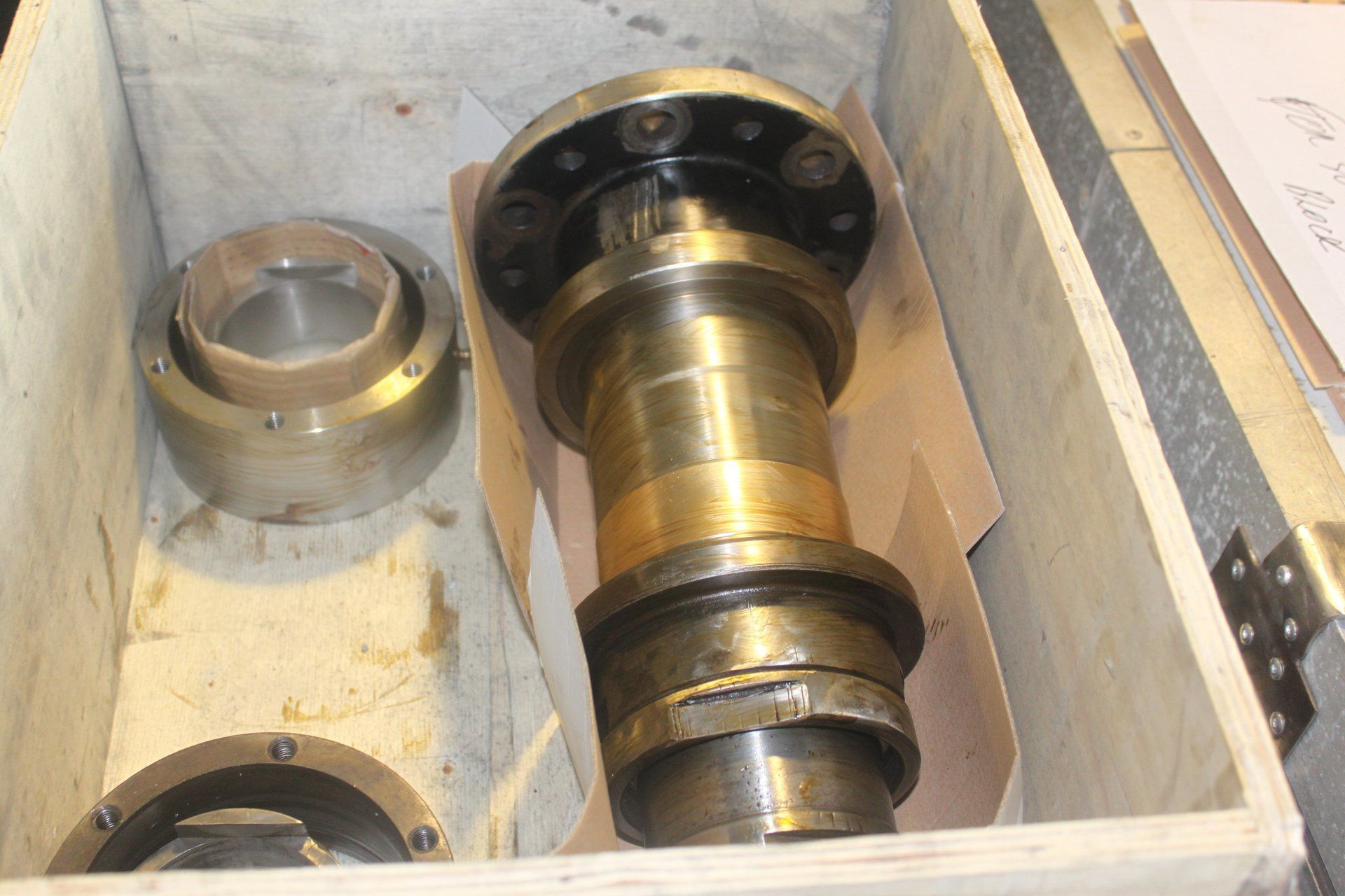 Industrial machine part being repaired