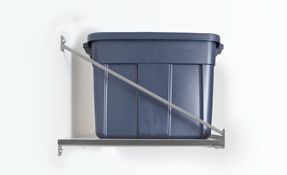 a blue plastic bin is sitting on top of a metal shelf .