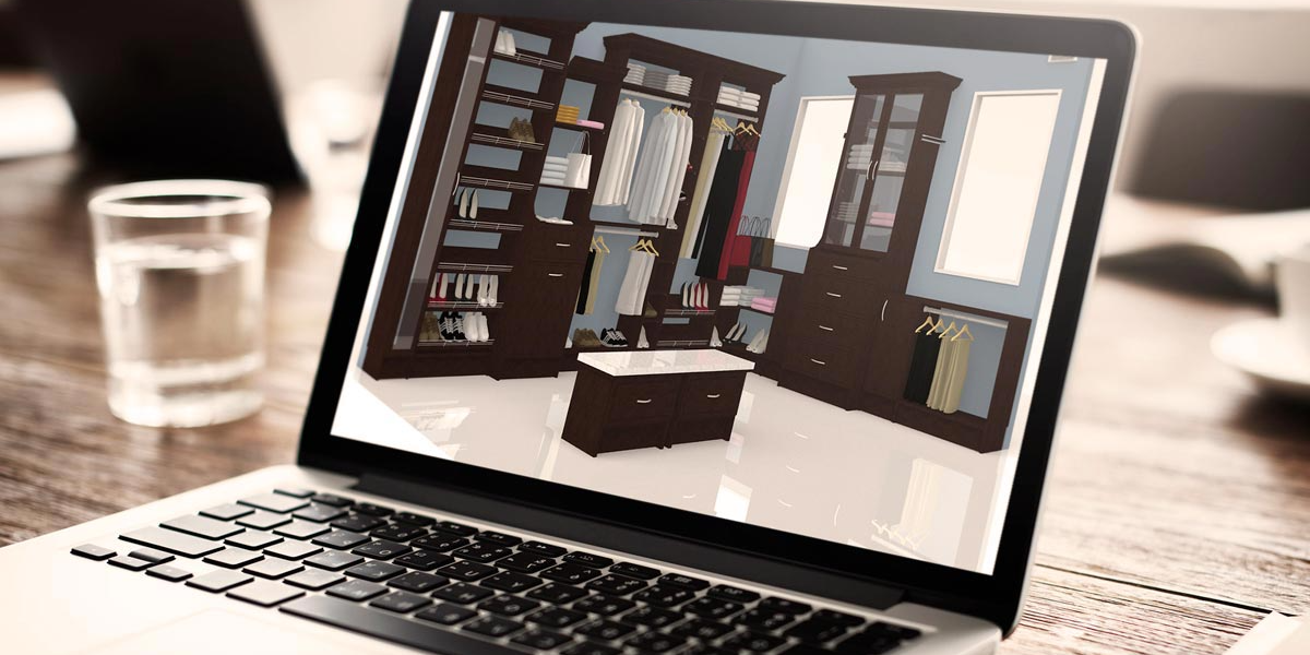 a laptop computer displaying a custom closet system design mockup in 3D .