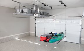 bluetooth controlled motorized overhead storage .