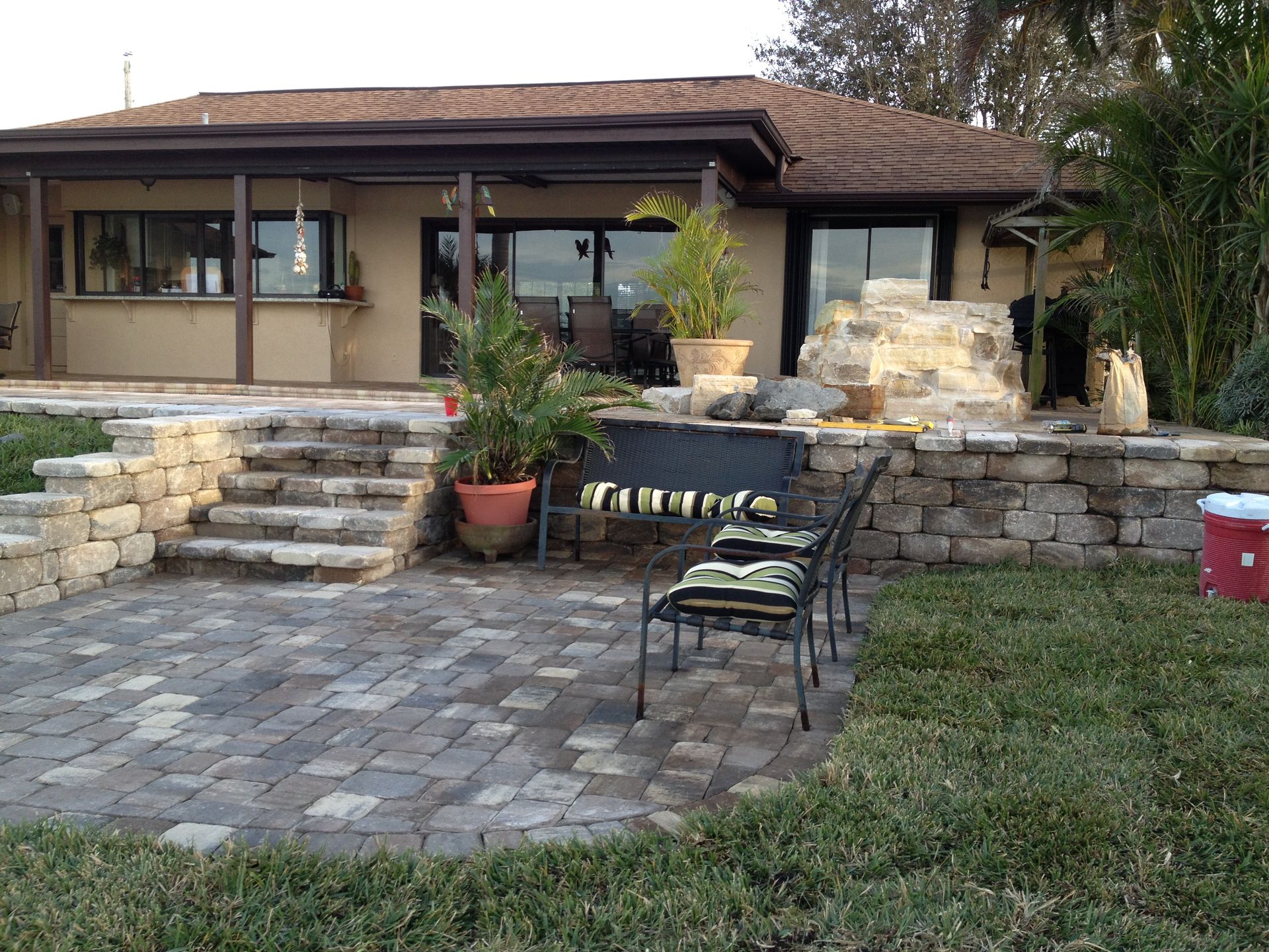 A house with a red cooler in front of it