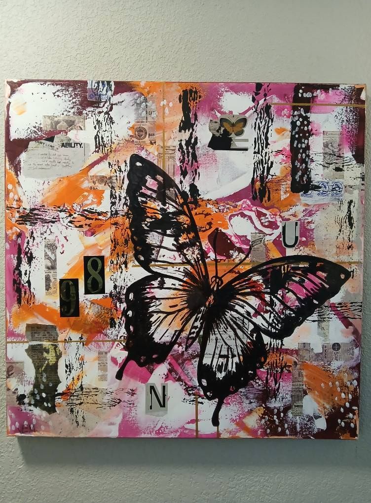 Abstract art: Butterfly with black outlines and colorful wings layered on a textured background.