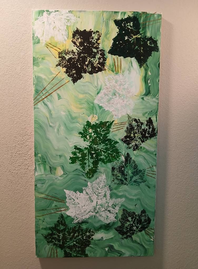 Painting of leaves in various shades of green, white, and black on a green and yellow background.