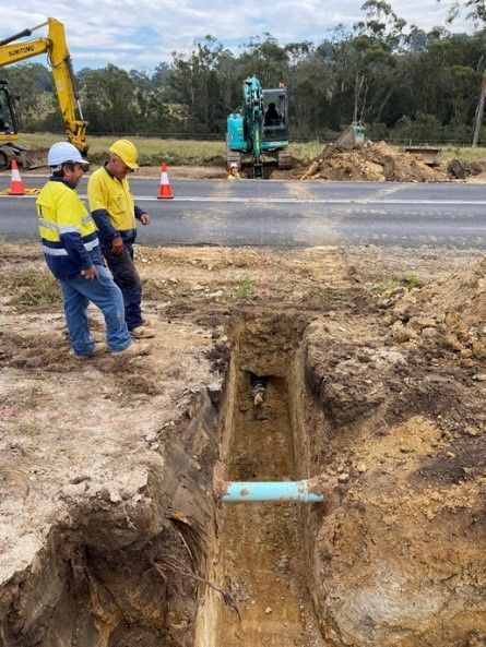 Two Workers Looking to A Dug Hole Ready for Pipeline | Young, Nsw | Ndl Pipe & Civil
