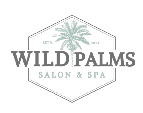 A logo for wild palms salon and spa with a palm tree on it.