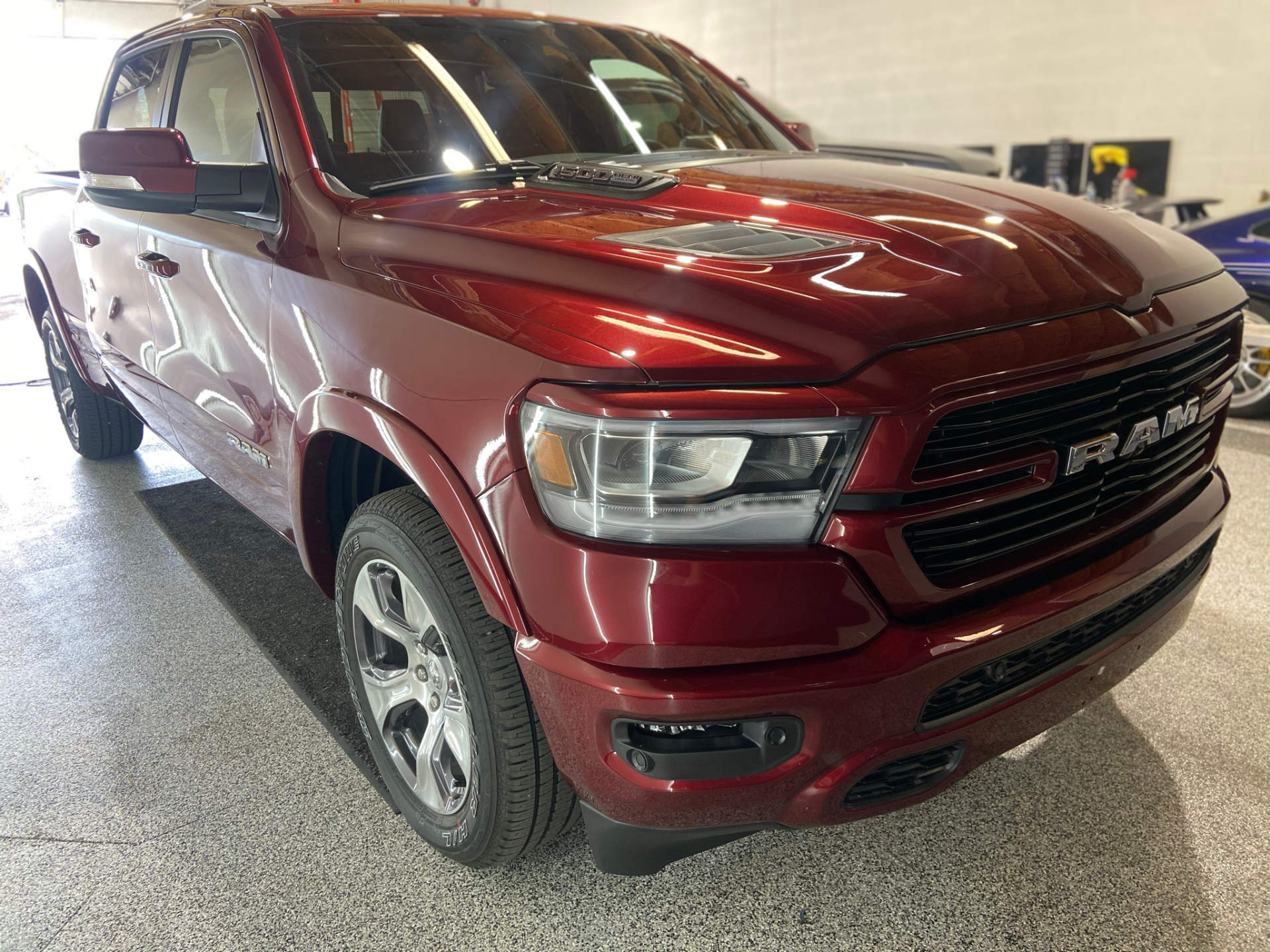 glossy red ram in the auto this world facility