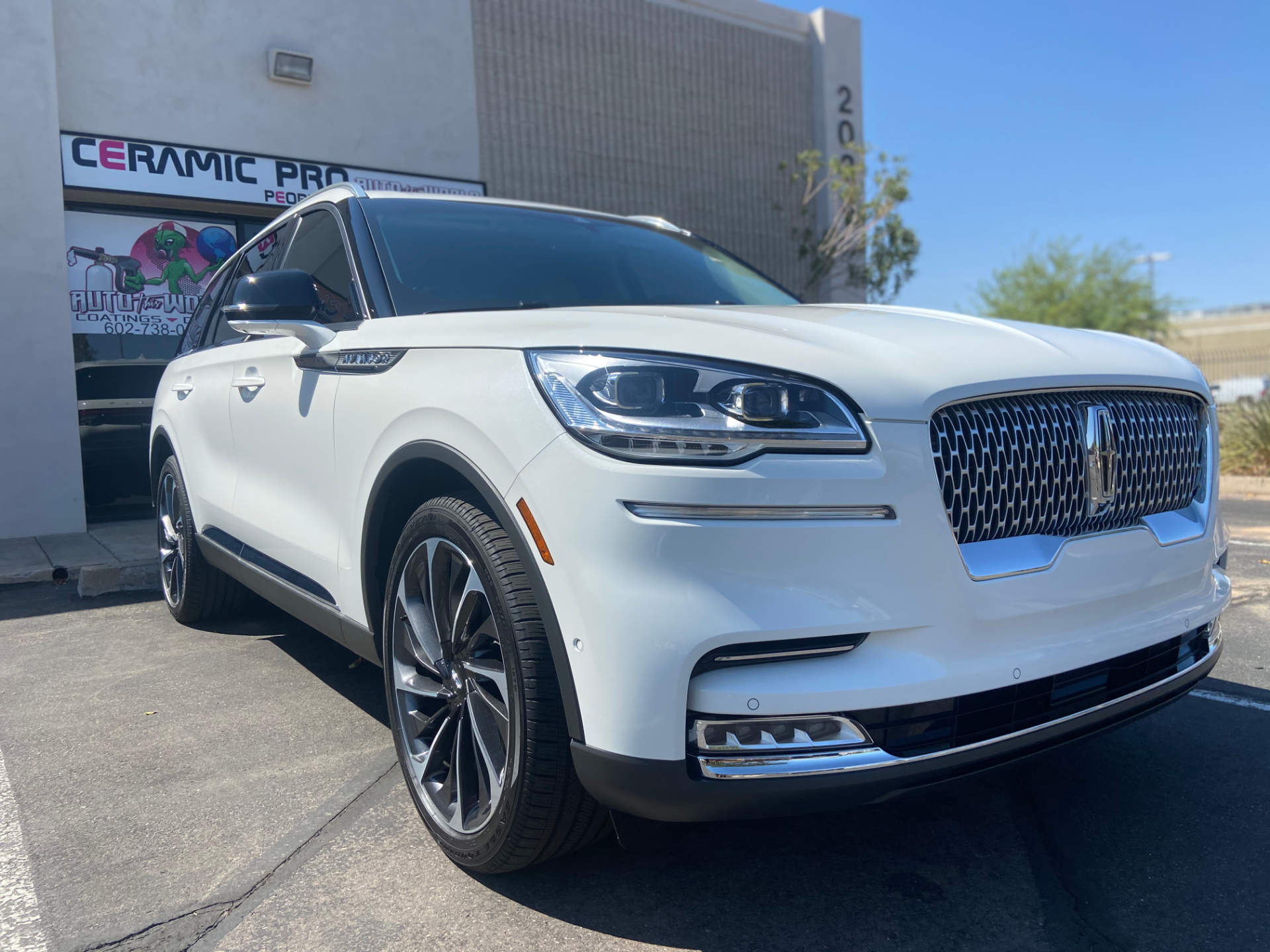 clean white lincoln nautilus parked at auto this world
