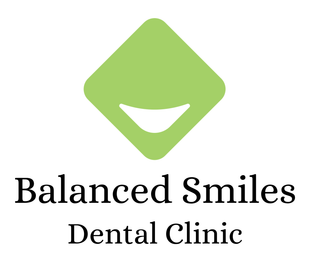 The logo for balanced smiles is a green diamond with a triangle in the middle.