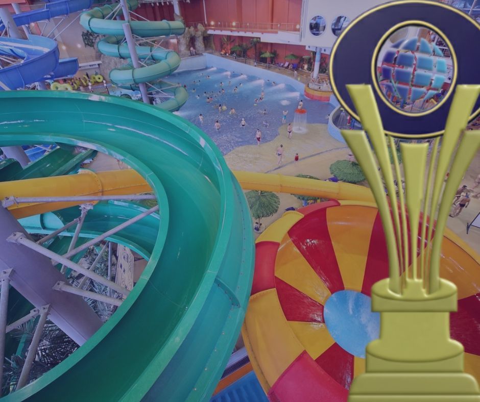 Water park with colorful slides, wave pool, and trophy logo.
