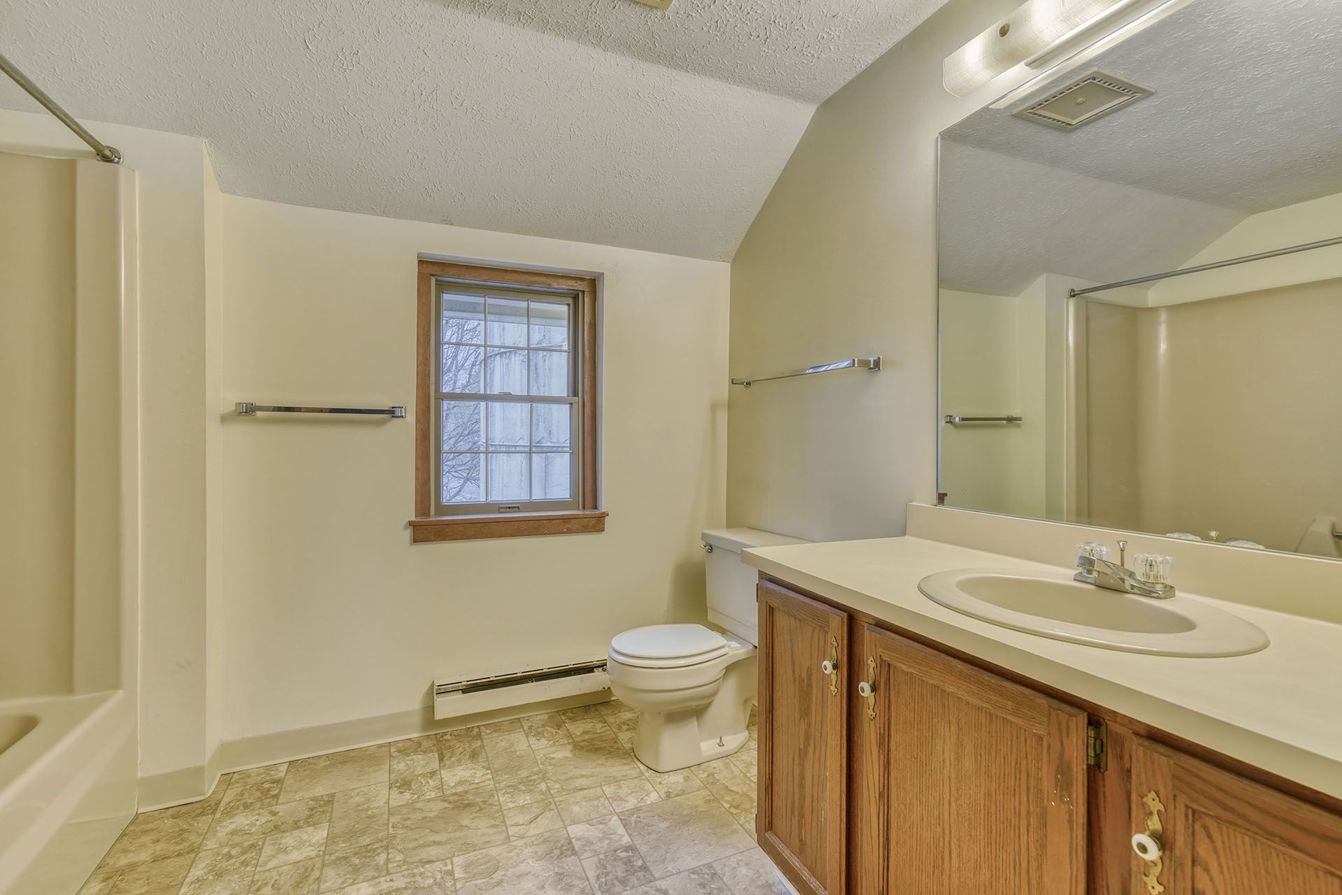 large bathroom with a window