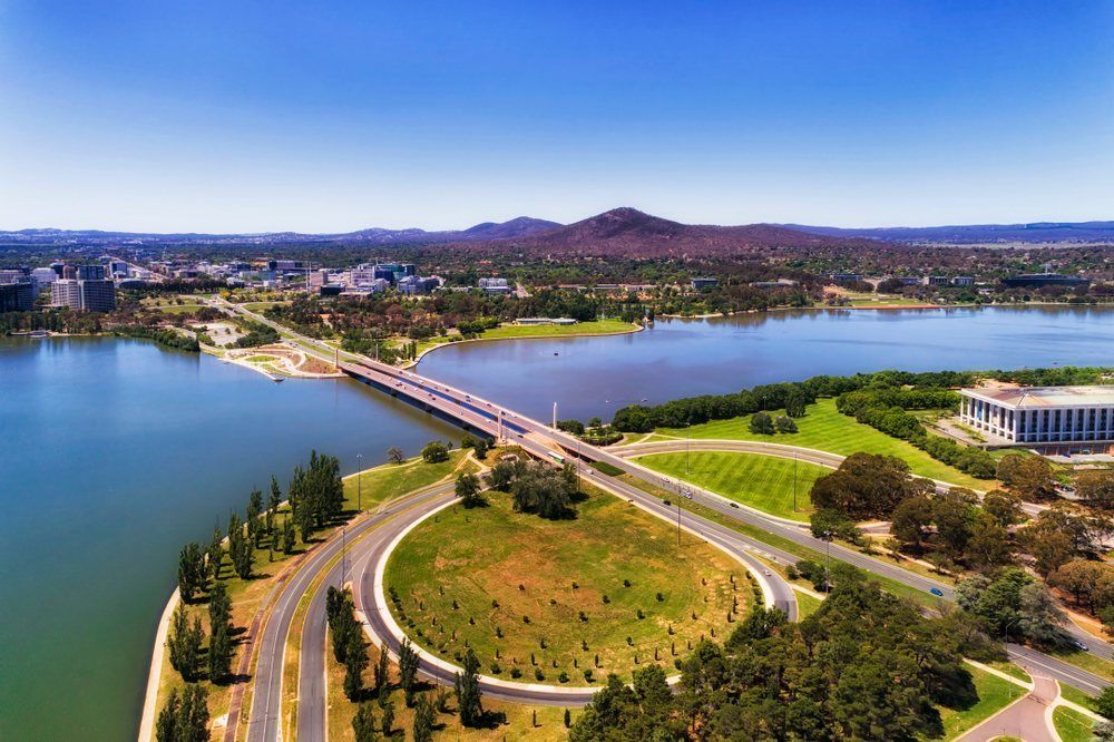 An Aerial View of a Bridge Over a Lake in a City — TeeJay Mechanical Repairs In Canberra, ACT