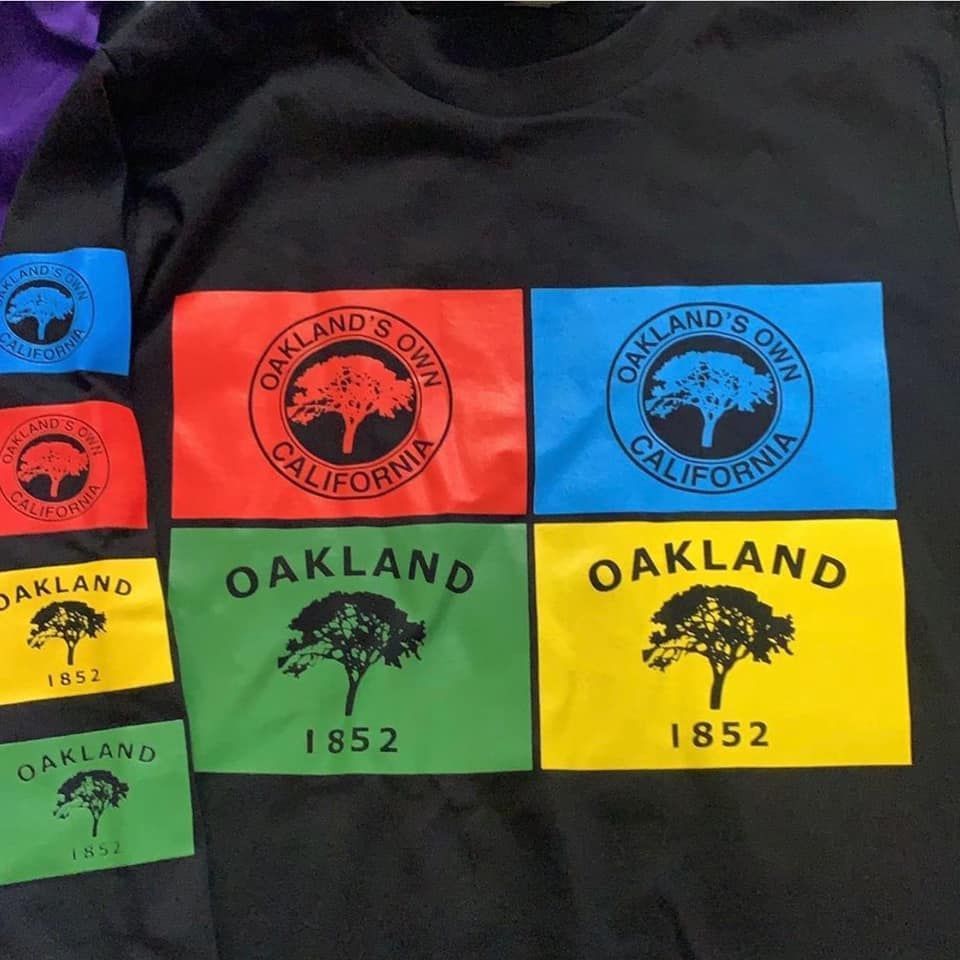 A t-shirt that says oakland 's own california on it