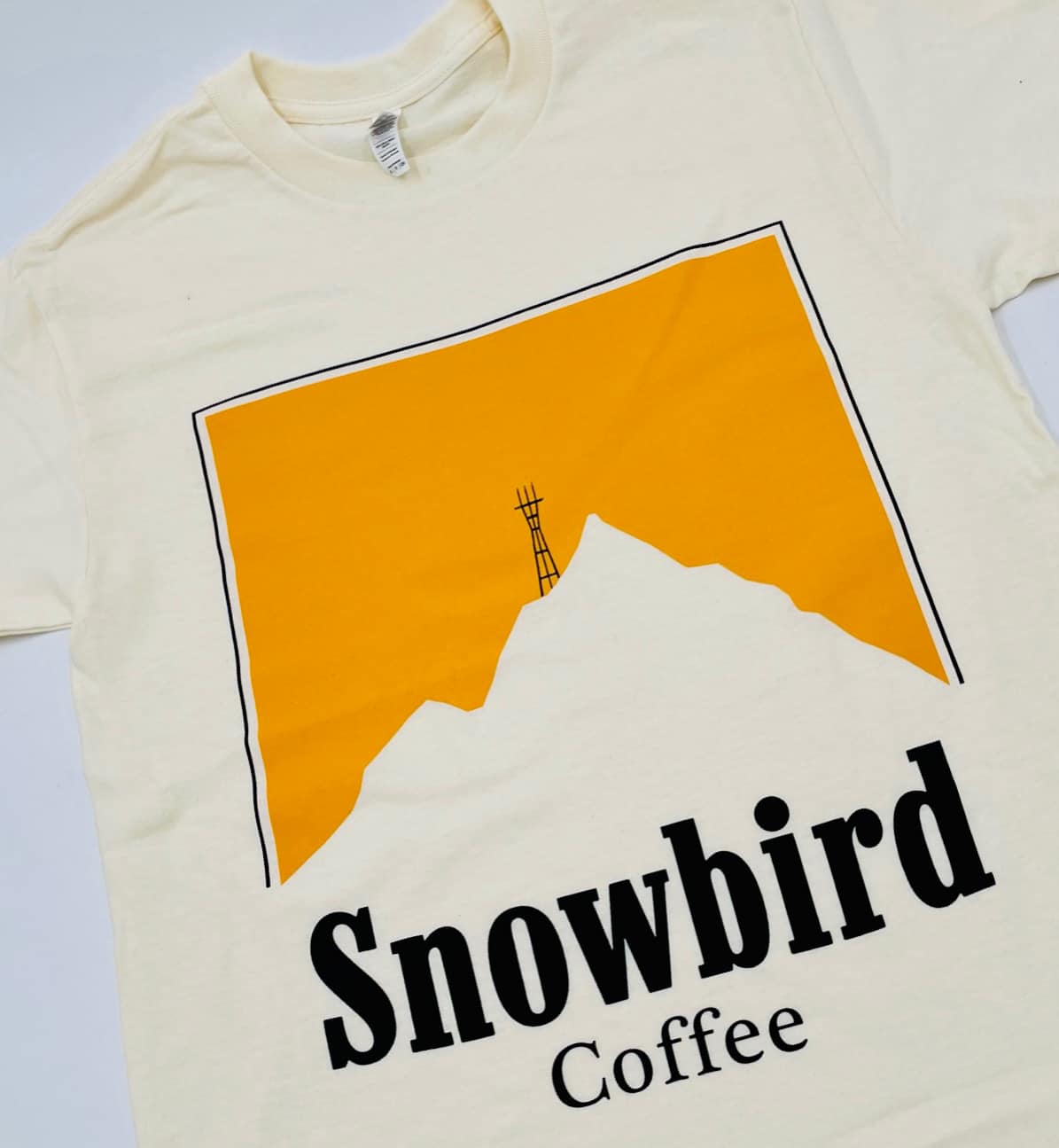 Shirt with the word Snowbird Coffee on it