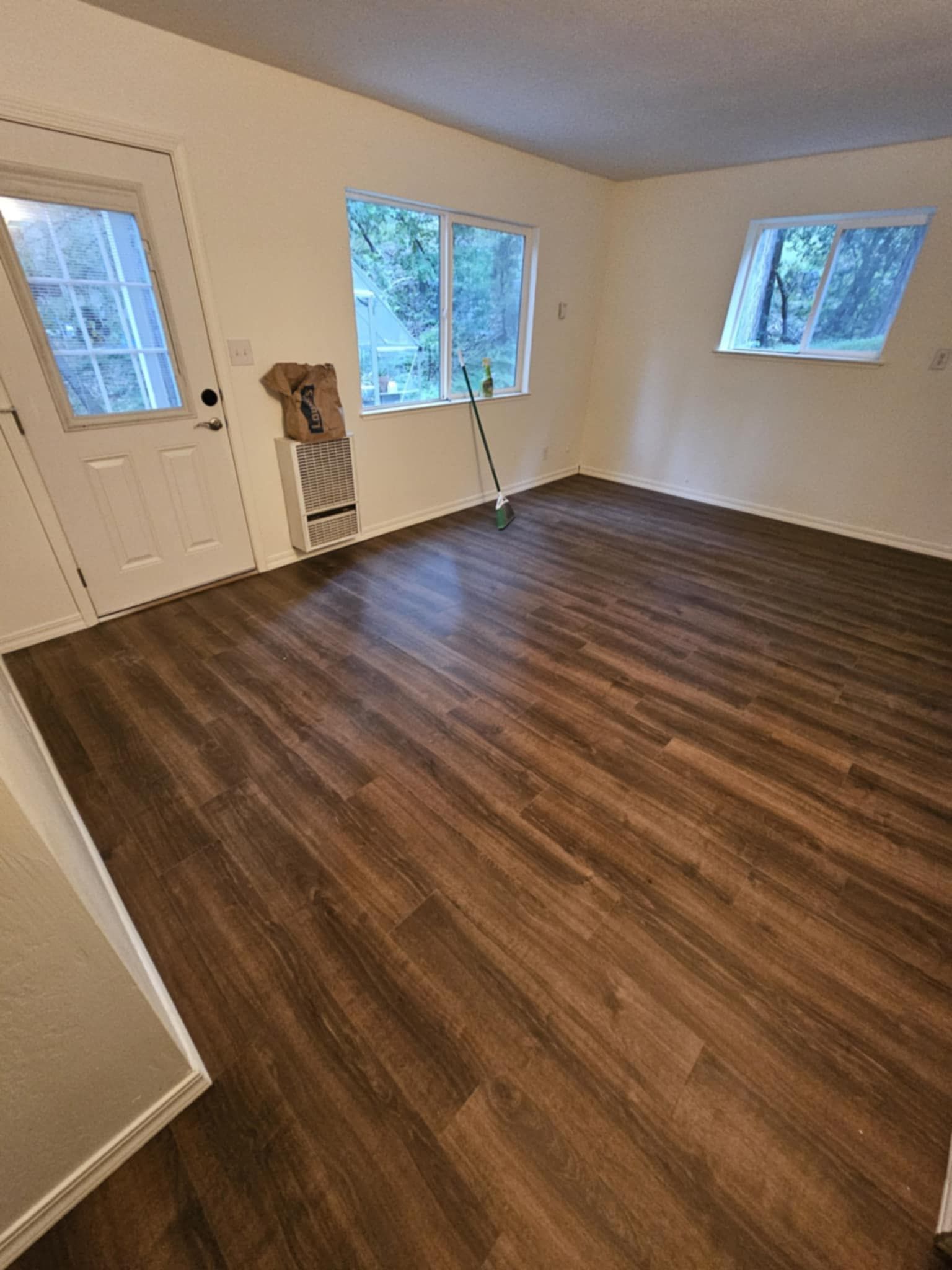 There is a mop in the middle of the room.