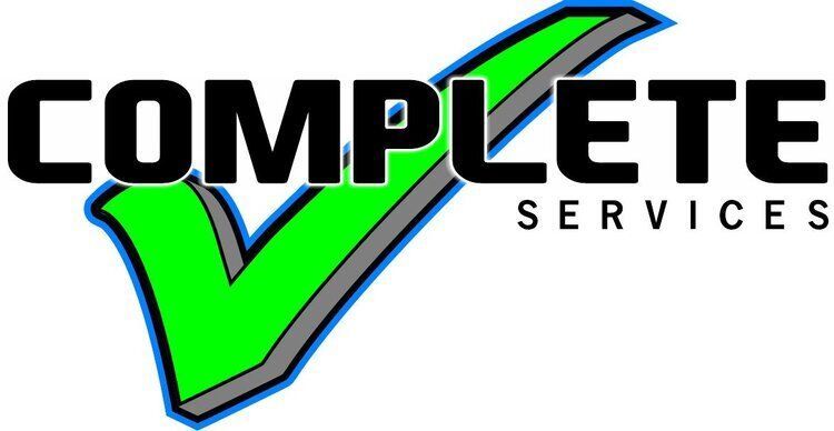 The complete services logo has a green check mark on it.
