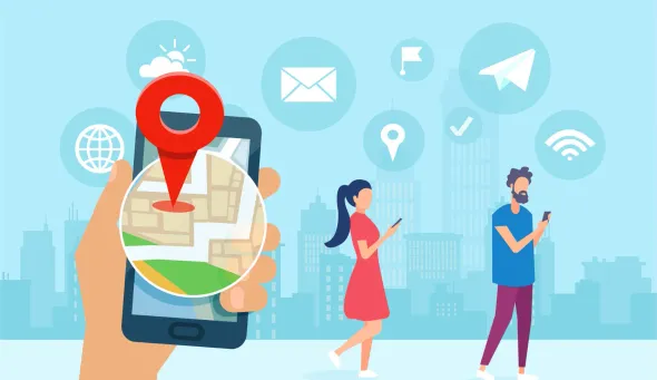 A hand is holding a cell phone with a map on it.