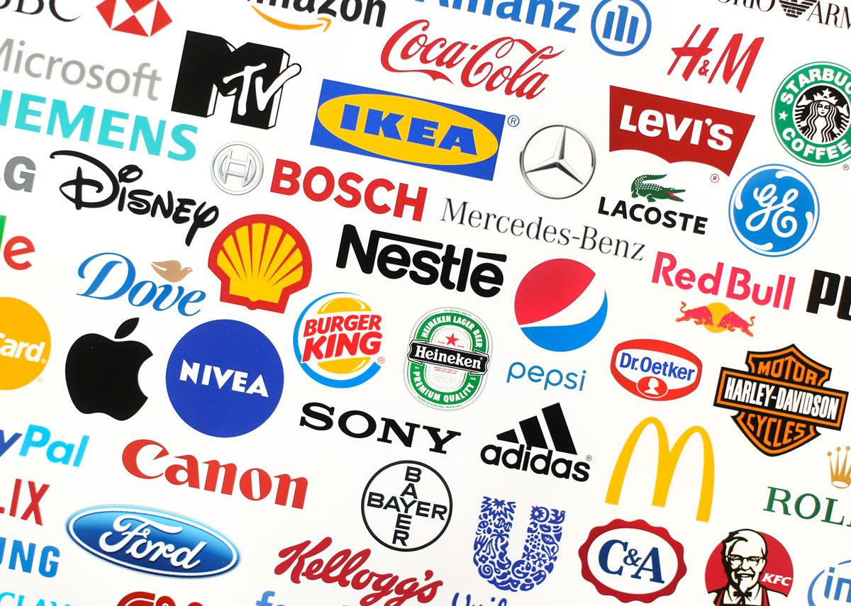 Logos of various international brands, including Coca-Cola, Nike, McDonald's, and others, against a white background.