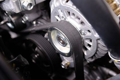 Deep inside the motor of a car looking at the timing belt - mechanic mount isa