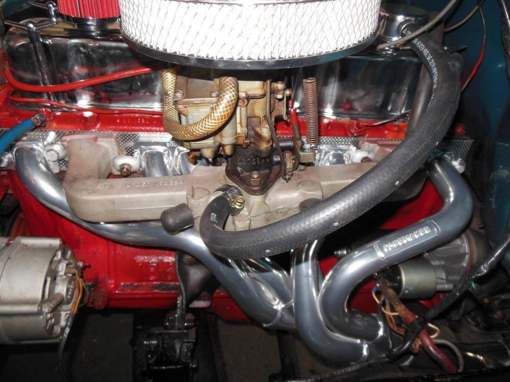 A Close Up of a Car Engine With a Air Filter — Bob Parkes Automotive in Hyde Park, QLD