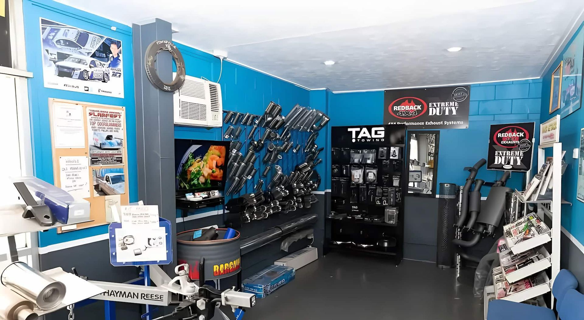A Room With Blue Wal ls and a Sign That Says Tao on It — Bob Parkes Automotive in Hyde Park, QLD