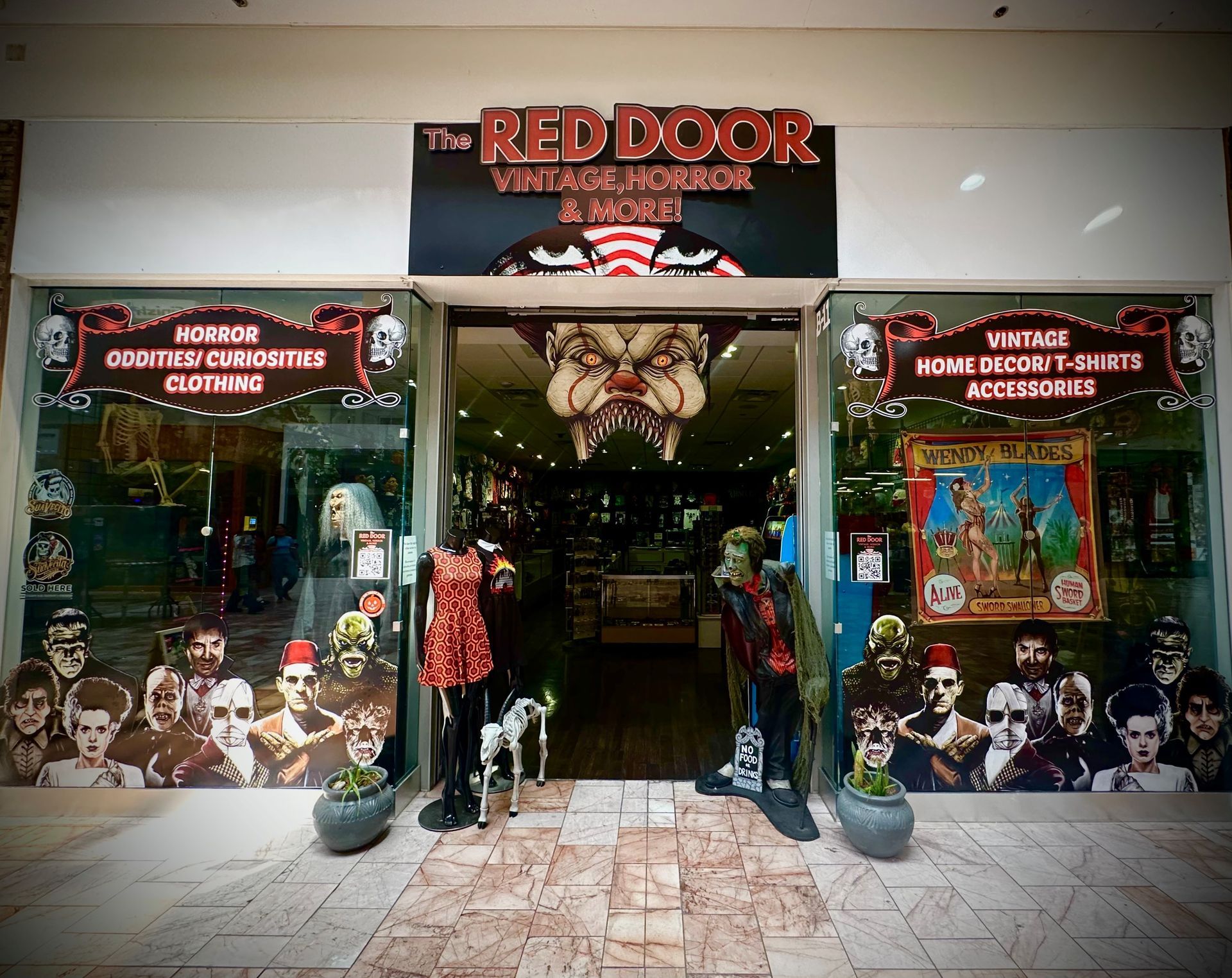 A large store filled with lots of clothes and t-shirts.