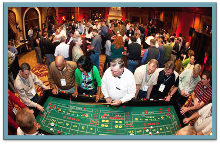 Crowded casino roulette table with players placing bets under warm red lighting